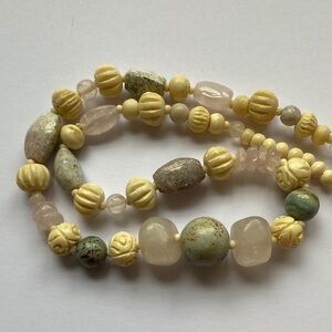 Carved bead and stone necklace